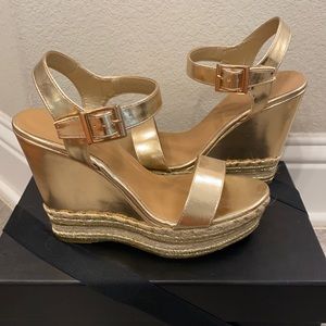 Never worn - gold wedge perfect for summer